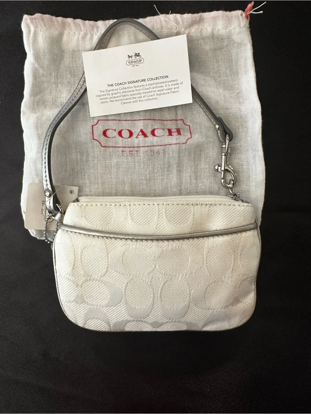 COACH Cream Signature Wristlet with Silver Trim - Picture 10 of 10